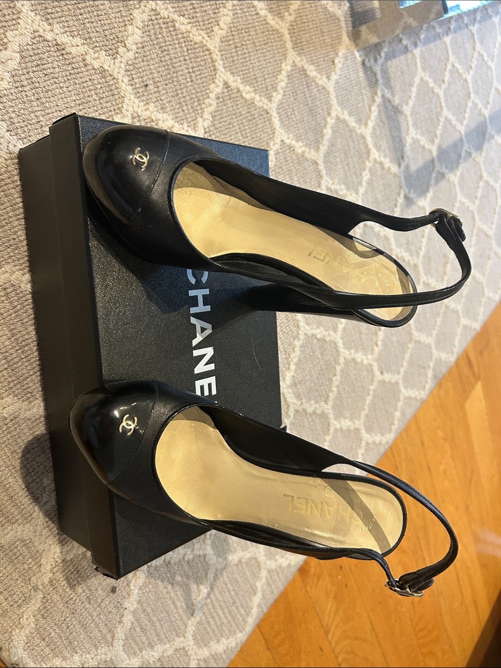 CHANEL Black Leather Slingback Mules with CC Cap Toe